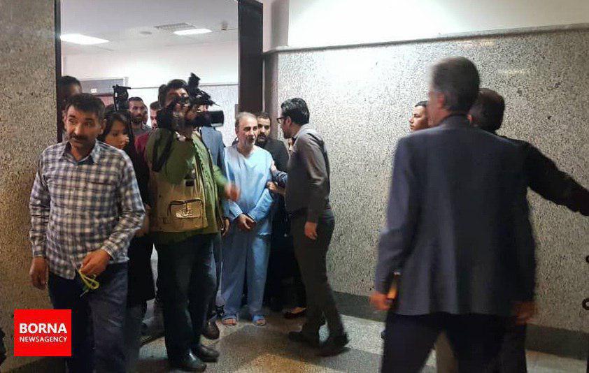 نجفی بعد از خروج از شعبه بازپرسی دادسرا (عکس)